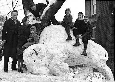 Family fun building snow sculpture